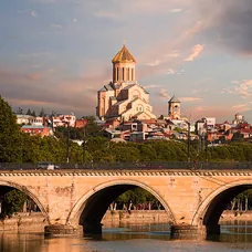 A stone bridge in Georgia at sunrise